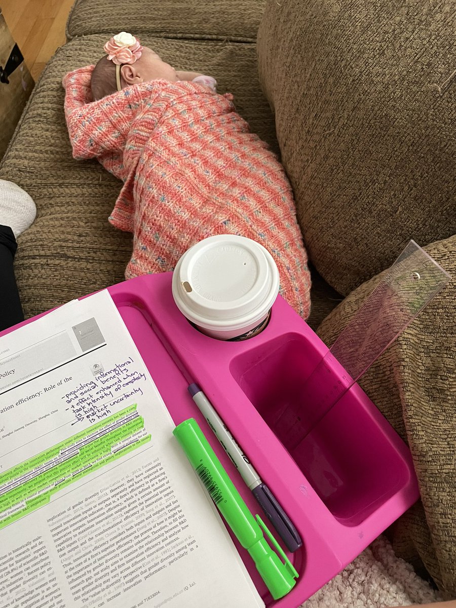 SamanthaKuula's tweet photo. A homework reality - baby sleeps and I read (and borrow my toddlers crafting lap desk 😂) #momlife #STEM #EMTM @LazaridisSchool @Laurier https://t.co/QqDc8gBMVZ