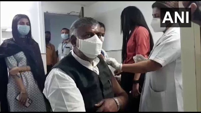 timesofindia's tweet photo. Delhi: Union Tourism Minister Prahlad Singh Patel received his first dose of the COVID19 vaccine today https://t.co/HbOhnVCbBs