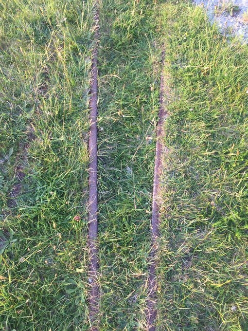 helenriddell's tweet image. Railway tracks on an island. Former British Admiralty engineers’ workshop built in early 1900s and later used as a base for Glenans Sailing School. A narrow gauge railway linked it to a nearby pier, remains of a turntable are also still there #BereIsland #EngineersWeek2021