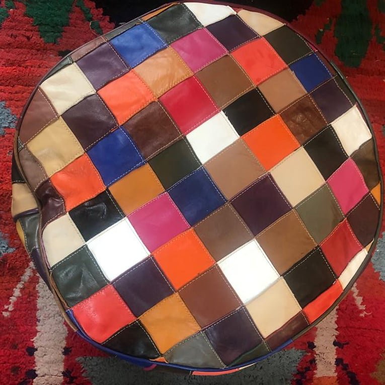 MarrakechBazaar's tweet photo. It's #WorldBookDay and we'd like to join in with our Multi-coloured leather pouffe. There's at least a passing resemblance ☺ #supportsmallbusiness https://t.co/3PwDVmTj0S