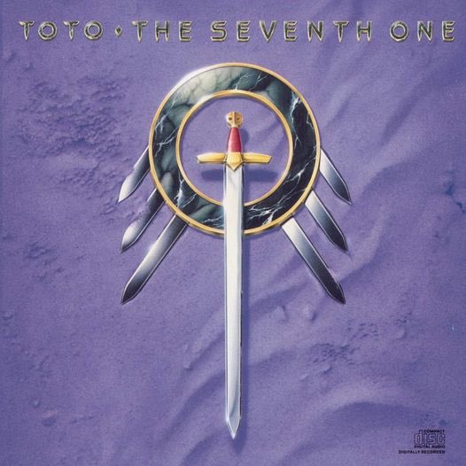 Hoy en 1988, Toto lanzó “The Seventh One”. Según el teclista y cantante David Paich, el álbum pretendía levantar las ventas de la banda, después de dos fracasos (1984: Isolation y 1986: Fahrenheit). Si bien “Pamela" tuvo un apoyo regular, la promoción de la disquera se estancó.