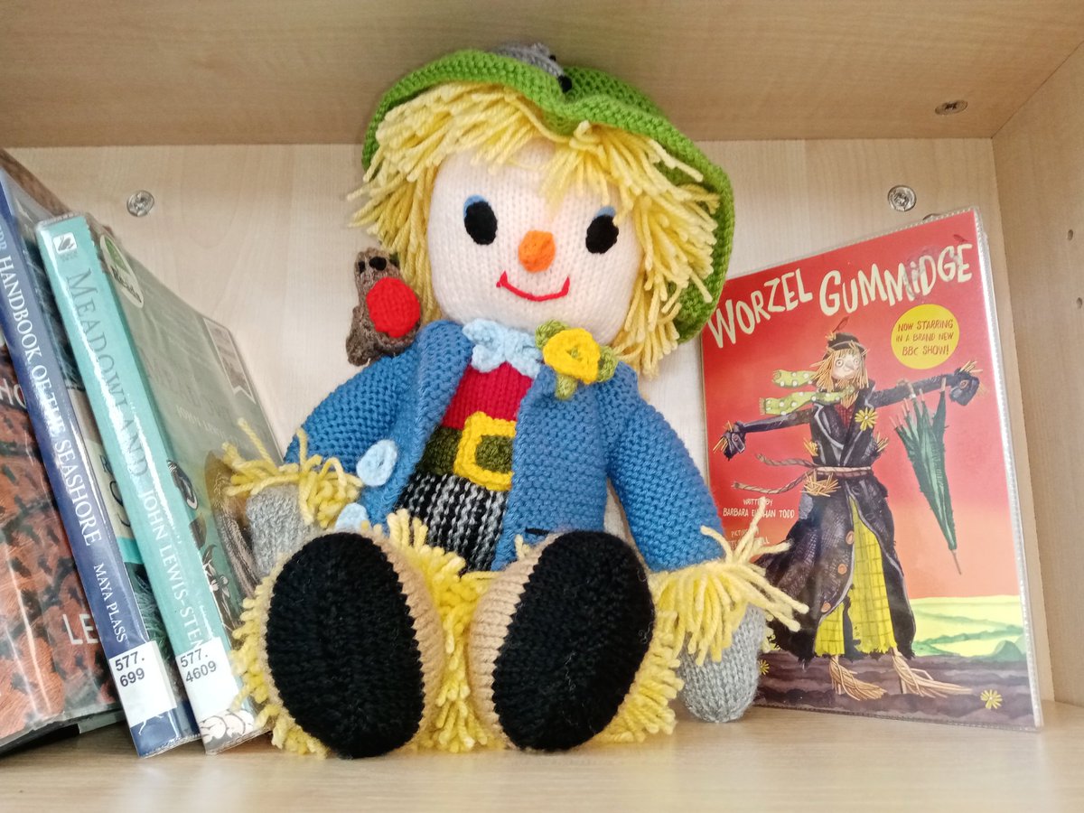 Can you guess, which section of the library our scarecrow has moved to today? There is a red herring in the pic...