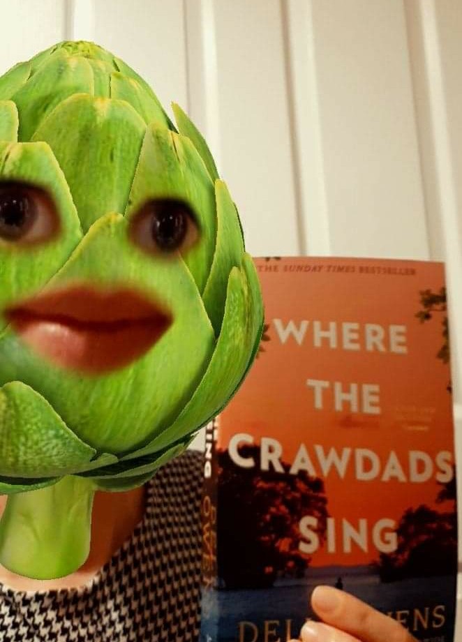 LibraryHodgson's tweet photo. ๐ญMASKED READER #7๐ Who is this fruity face? Can you recognise this teacher holding 'Where the Crawdads sing' by Delia Owens? #fruityfilter #maskedreader #HappyWorldBookDay https://t.co/dNf5Mb76n8