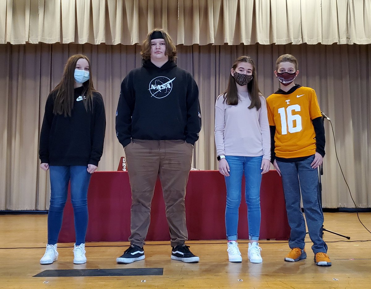 Congratulations to our 8th grade DRAGON Award recipients, Addie Sanders &amp; Wyatt Sadler for grey team and Aubrey Stamper &amp; Chandler Saine for maroon team. The Dragon Award is earned for exhibiting our Essential 30 behaviors and exemplifying the Dragon Spirit! 🖤🐉
