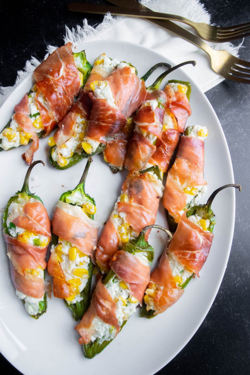 ParmaHam_USA's tweet photo. Need a kick to get you over hump day? Add a little ~spice~ with these Jalapeno Poppers with Prosciutto di Parma, Corn and Goat Cheese from @JawnsICooked. 🌶 🤤 Now that's an elevated app we can get behind. Grab the recipe linked below. 

https://t.co/KucUzHsVdU https://t.co/TkRaKkKsEI
