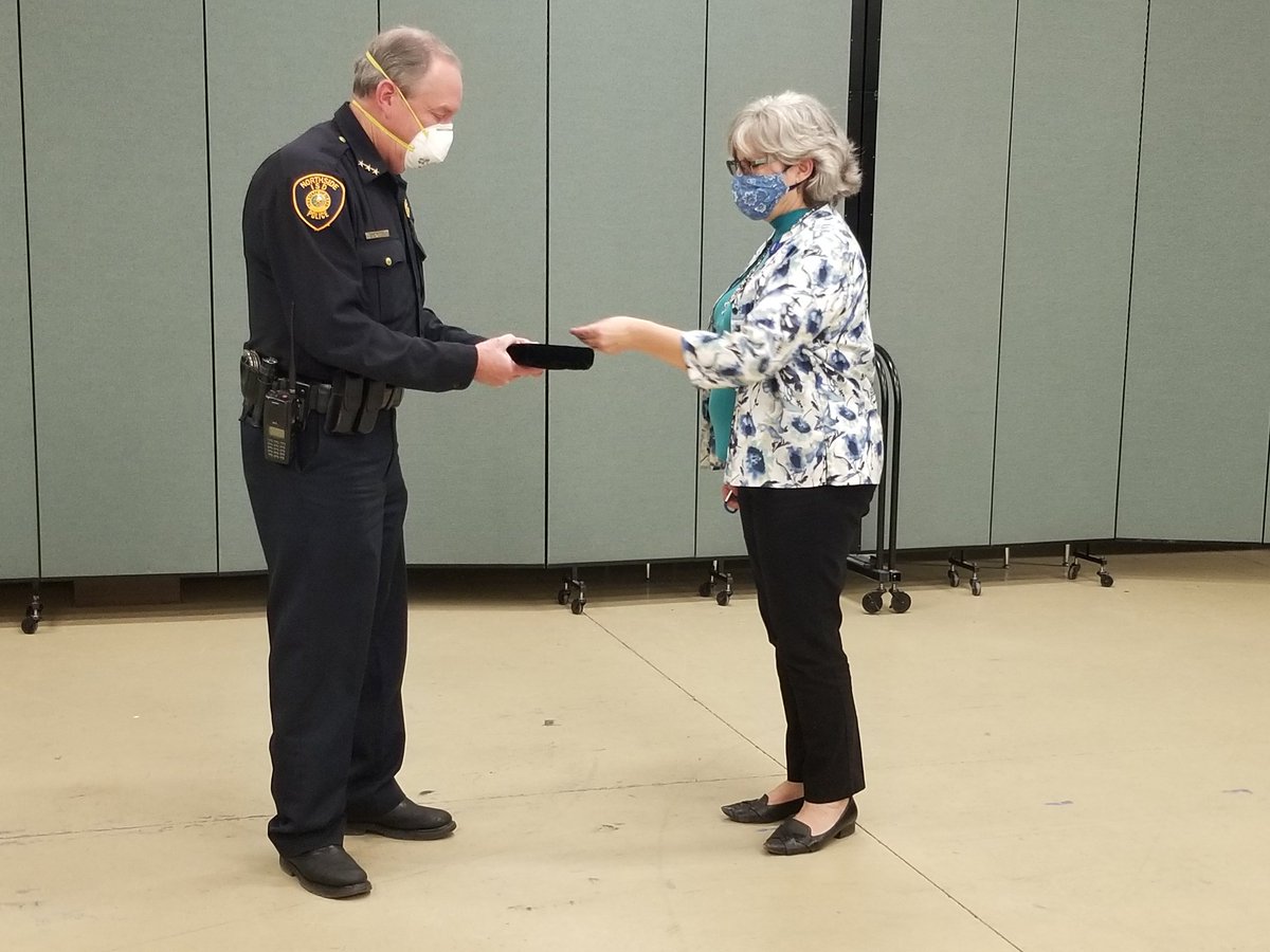 Today we gave Mrs. Reynolds one of department's challenge coins for all of her support she's given us.