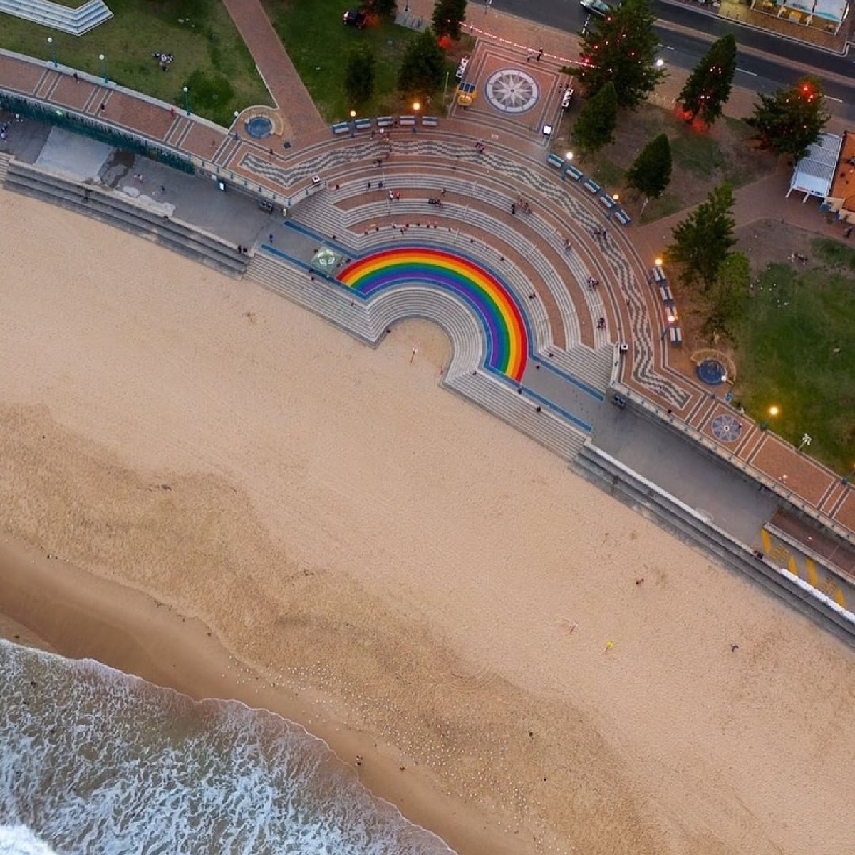 Australia's tweet photo. Rain(bow), hail or shine, #CoogeeBeach is always spectacular 😍 🌈 

Captured by IG/gavogram, @NewSouthWales Coogee Beach sure is looking the part in preparation for @sydney_sider's  iconic #MardiGras parade this weekend!

#seeaustralia #mardigras2021 #newsouthwales https://t.co/w5yEwAtjkA