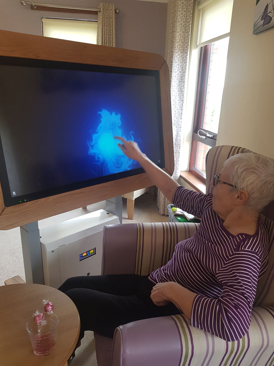 These ladies have also been keeping themselves busy in #CochraneCareHome and entertained by playing different games.
Betty also had a wee go of the magic colour app on the interactive tablet.