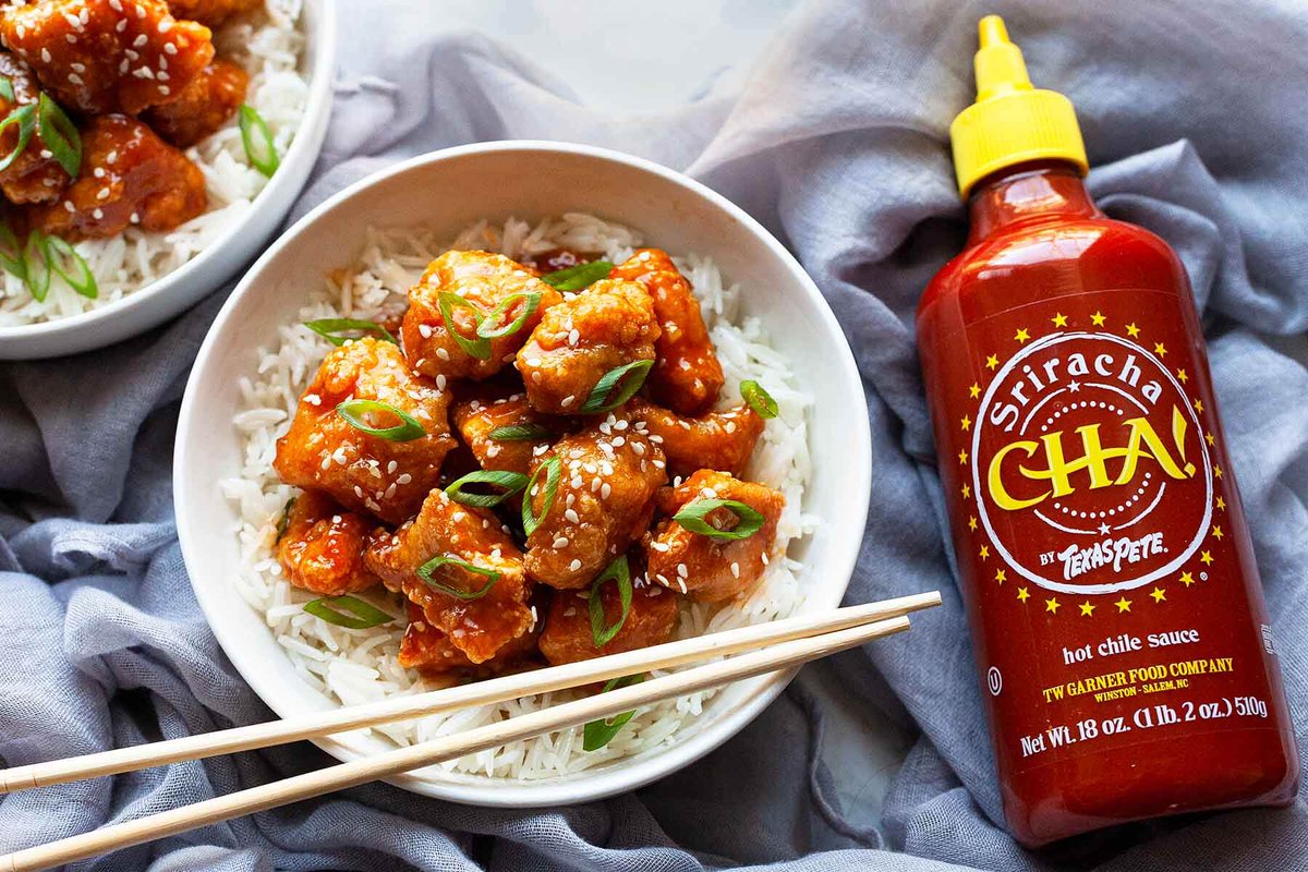 #ad <a href="/texaspete/">Texas Pete Hot Sauce</a> Honey Sriracha Chicken – Spice up springtime with these little flavor bombs of crispy, crunchy chunks of chicken in the most amazing tangy, sweet, and spicy sauce. Made with CHA! by Texas Pete® Sriracha Sauce #spiceupspringtime #SauceLikeYouMeanIt #TexasPete