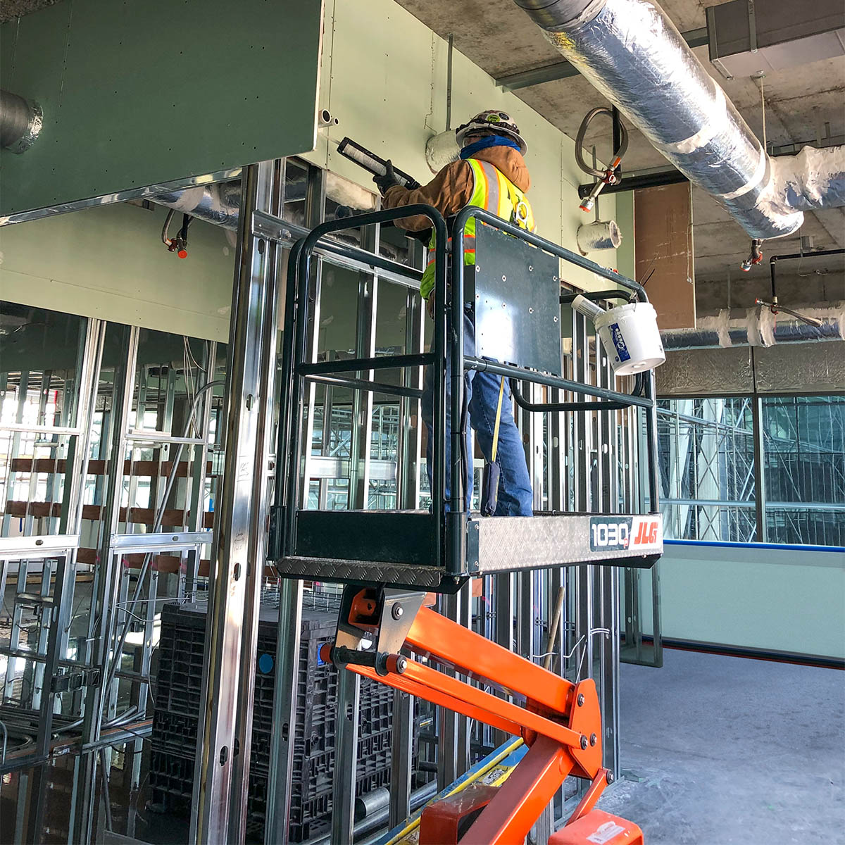 Workers on this #construction site in #NashvilleTN used the new #JLG 1030P in tight spaces where they didn't want to damage finished drywall. It enabled them to run wires and finish electrical work in a safer, more efficient way than using a ladder. bit.ly/2NBb8WO