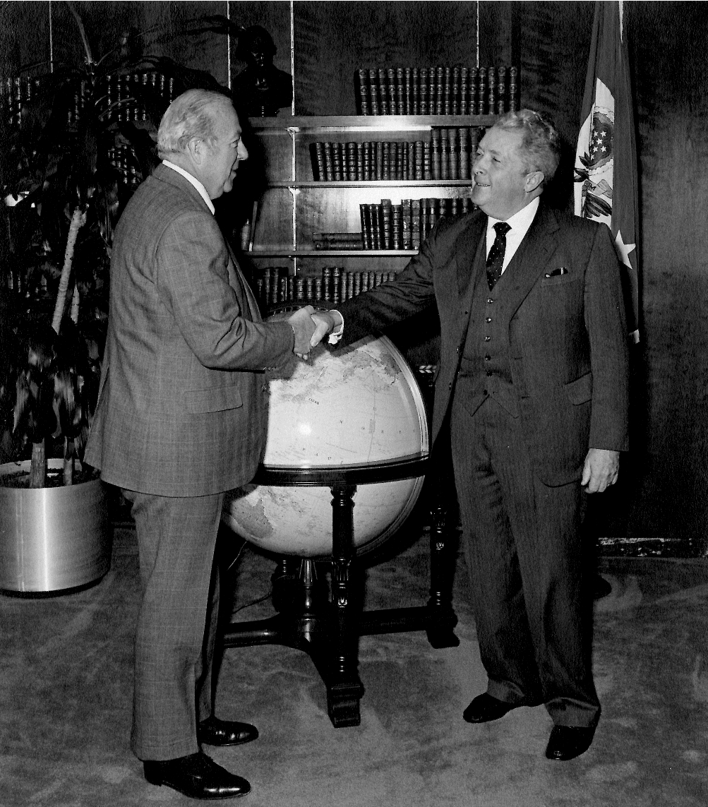 Ambassador to the Republic of Korea, Richard "Dixie" Walker (right) meets with US Secretary of State George Shultz in 1983. Appropriately, a sizeable globe is a statement feature in the room. 
#ArchivesYouAreHere #ArchivesHashtagParty