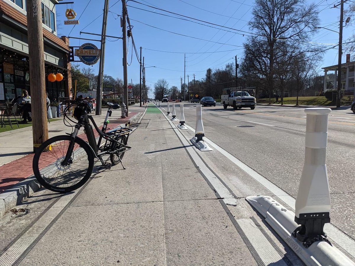 Protected bike lane on Moreland in Little 5 Points - what a thing of beauty. #little5points @L5Alliance @L5PBiz 

Photo credit: @cqholt