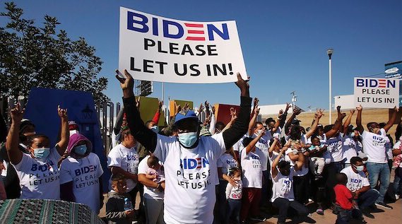 Who is paying for these shirts and signs? Does anyone actually believe this is just an organic caravan of people?