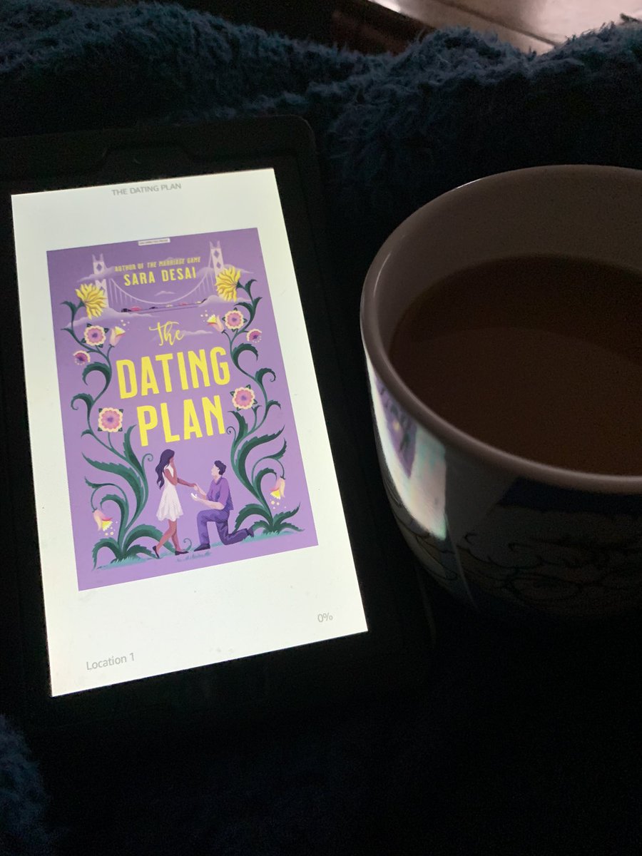 Teen1 at one end of the couch crying as her book draws to a close. Me at the other end laughing as I’m reading #TheDatingPlan by @saradesaiwrites I’m loving this moment.