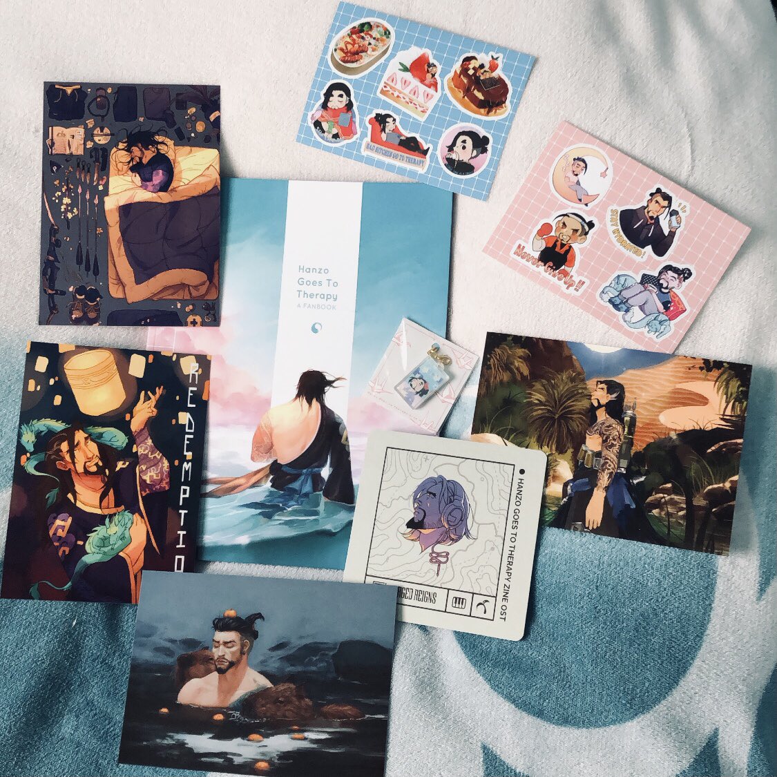 My <a href="/hnzotherapyzine/">Hanzo Goes to Therapy Zine 🌱</a> arrived some days ago. Giant thank you to everyone who made this possible!! 💙〰️💙