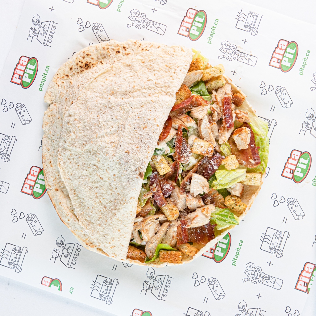 PitaPitCanada's tweet photo. Our Mighty Chicken Caesar pita tends to be a fan favourite... There's just something about the combination of chicken, bacon, croutons, lettuce and parmesan that satisfies the tastebuds! 😍

Have you tried a Mighty Chicken Caesar before? https://t.co/tvnpQP916M