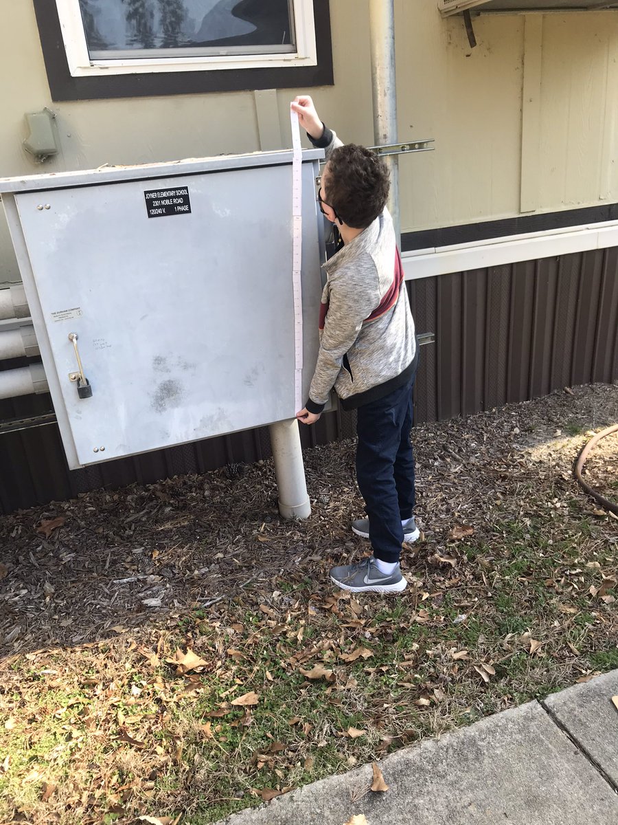 DouglasNekeisha's tweet photo. After creating their yardsticks, they put them to the test measuring objects outside and collecting data! #MathMatters #NC2MD1 @JYJoyner https://t.co/f3wXs4pRZ0