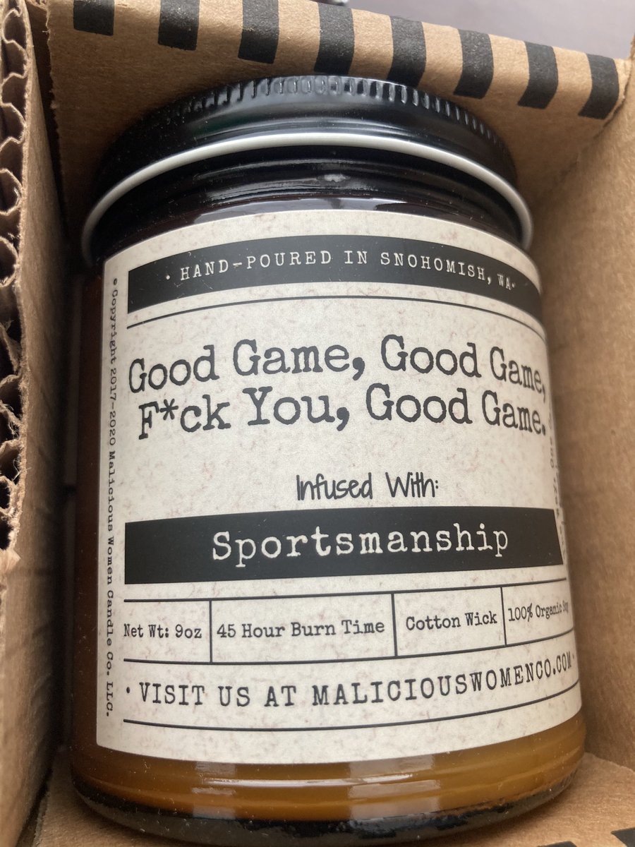FakeAdultHere's tweet photo. This candle was placed on my desk at an unknown time. I even sent a mass email out to my work BUILDING and nobody has taken credit for the gift. They clearly know me and my love for competition, feminism, and the fuck word https://t.co/w5NfzWhhAk