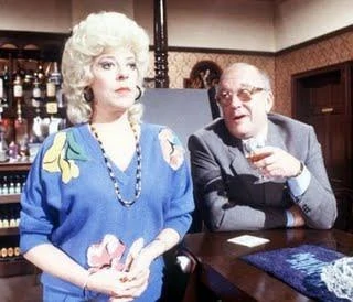 Corriepedia's tweet photo. "Look at this place, a backstreet pub catering for folk wi' backstreet mentalities. Where's the excitement, where's the glamour? Their idea of getting dressed up is if they're wearing matching socks." #CorrieQuotes #AlecGilroy #PeterWhalley https://t.co/hNrhsRYZ4c