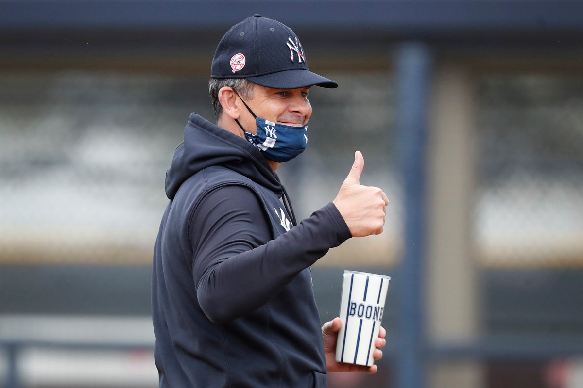 Beaming Aaron Boone back with Yankees after health scare