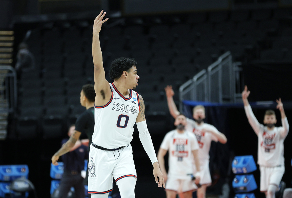 ESPNInsights's tweet photo. Gonzaga finishes with 98 points, its most ever in an NCAA tournament game.

They reach the round of 32 for a 12th straight NCAA Tournament. 

Only Kansas has a longer active streak, which they extended to 14 straight earlier today. https://t.co/Z2uoQOYkH2