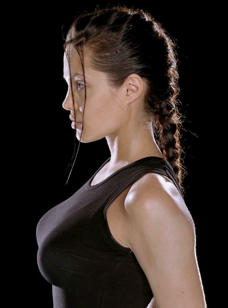 Hidden Movie Details on X: Angelina Jolie wore padding in her bra for the  film 'Tomb Raider' [2001] in order to more closely resemble the bust of the  video game version of