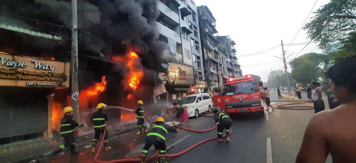 maytoekhine's tweet photo. A sportswear store was set on fire by military terrorists on #Tamwe around 5.30 am. Only after the fire was stopped, terrorists came back and threatened civilians they would shoot if they won’t leave the area. #WhatsHappeningInMyanmar #Mar19Coup https://t.co/IStGXeBC80