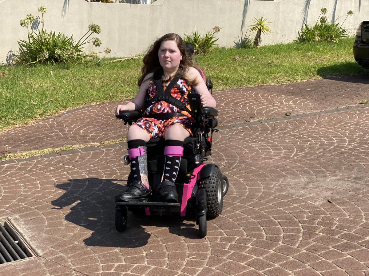 MagicMobility's tweet image. This Feel Good Friday Aleacia received her new pink #Magic360 off-road #powerchair. Once fitted to perfection by our Wheelchair Specialist Aaron, Aleacia had a ball zooming up the street testing out her new wheels! She can't wait to show off her Magic 360 at school next week!