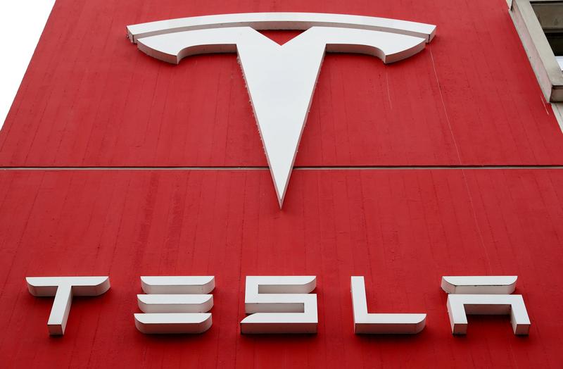 Reuters's tweet photo. China bans Tesla cars in military complexes on concerns about cameras: Bloomberg News https://t.co/HKuClFSgAq https://t.co/SKvvUaspWP