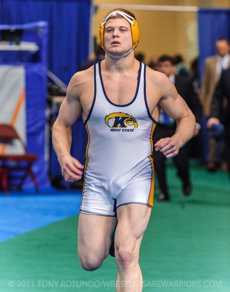 KentStWrestling's tweet photo. #FlashBackFriday On this day 10 years ago, Dustin Kilgore pins Oklahoma State’s Clayton Foster to become the first National Champion in program history! #GoFlashes https://t.co/U04tGNN6yU