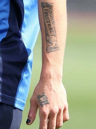AFLtatts's tweet photo. Here’s our king of getting a bunch of random pictures tattooed on your arms and legs, Tom Liberatore. That Hellfish tatt is sick though.

#AFL #AFLPiesDogs https://t.co/TswkrKuWN1