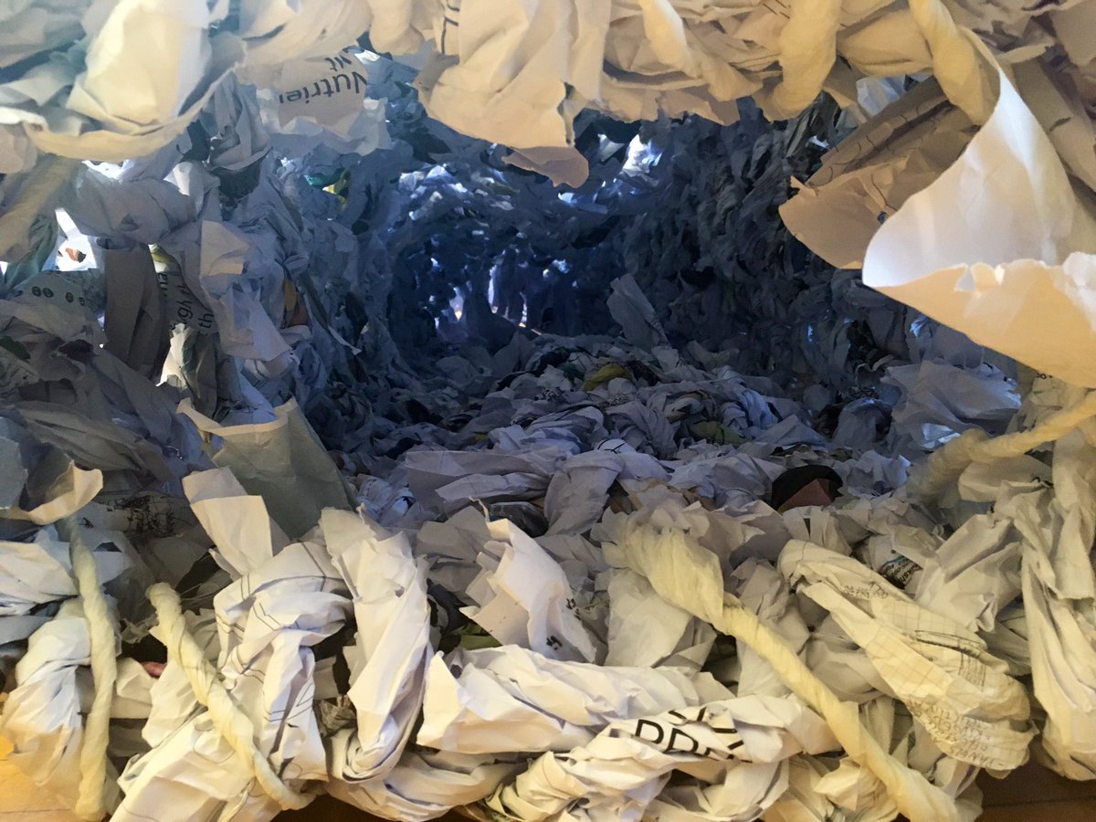 ReclaimedFiber's tweet photo. After being rolled up for about a year, the paper cocoon developed a few concave folds but magaged to still be able to support itself without any assistance. Interestingly, the blue hue is not a filter https://t.co/1CLim3iqTb