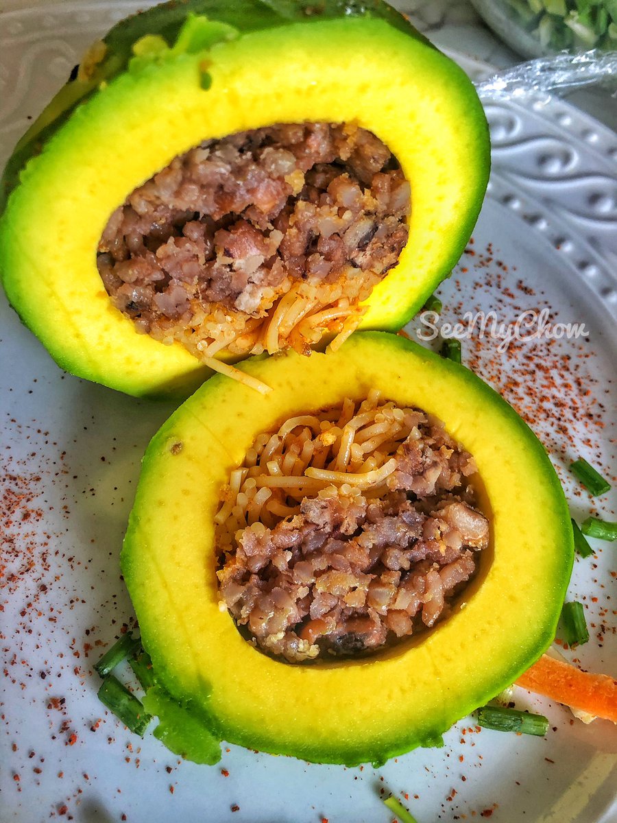 seemychow's tweet photo. At the heart of 🥑 lies the beauty that is waakye. 😉 

#seemychow #waakye #food https://t.co/G2rFBQne8z