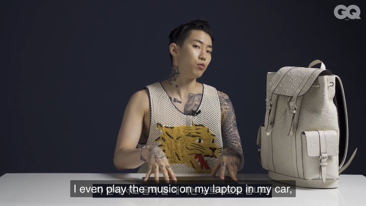 Jay using his laptop to listen to music in the car while we live in the 21st century that has Bluetooth