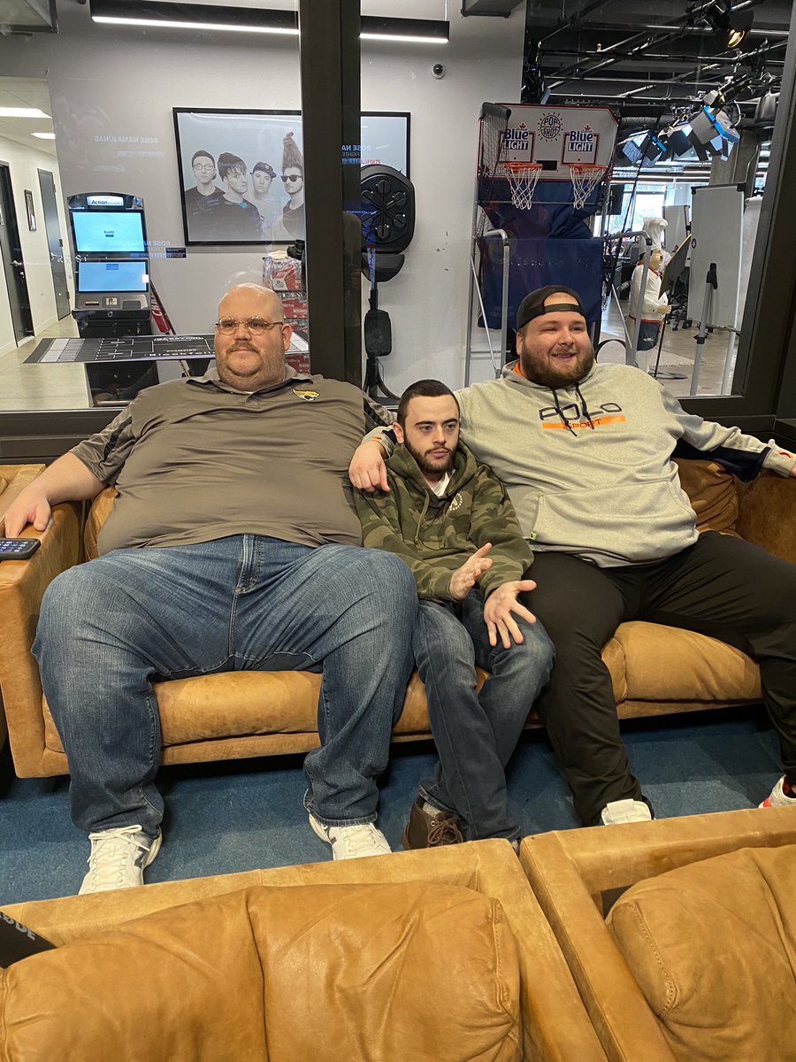 rone's tweet photo. Any seat’s a good seat when you’re watching March Madness https://t.co/Y6y53UGK63