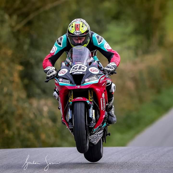 #flyingfriday ! With Adam McLean taking some air at Cookstown100 2020. Credits to Graham Service 👏👏👏 Stunning shot! #LoveRoadRaces