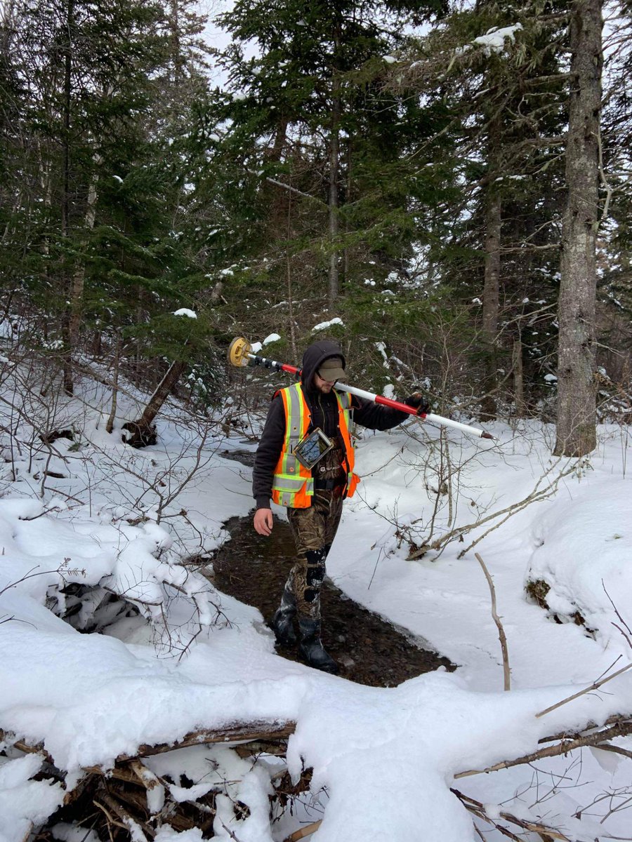 DesignPointEng's tweet image. The snow can’t stop our surveyors! Ben is all smiles completing a watercourse survey in Cape Breton this week ⛄️