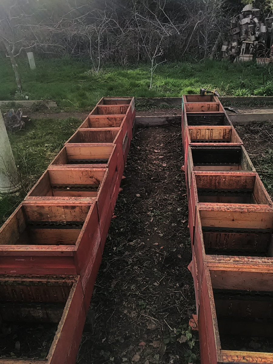 Old supers destined for the fire. Gave them to a friend who has turned them into herb planters.