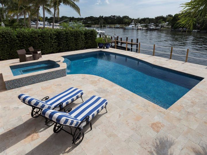 Imagine relaxing with a friend or loved one in this outdoor living space. Soak up the sun, views and relaxation with a backyard swimming poo...