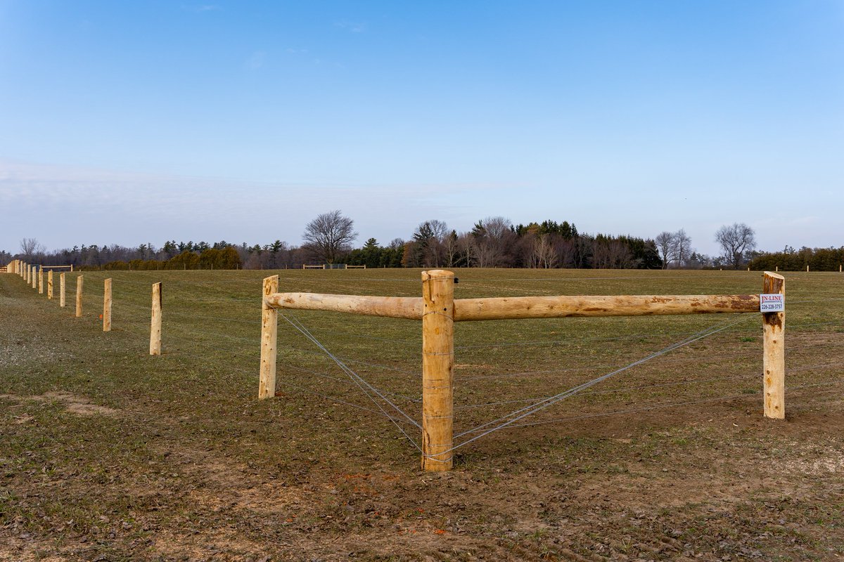 InLineFence's tweet image. Another farm fence completed in Otterville. The cattle is ready to live the good life!  A combination of wood-board and high tensile fencing including gate systems. A good way to end this beautiful week!