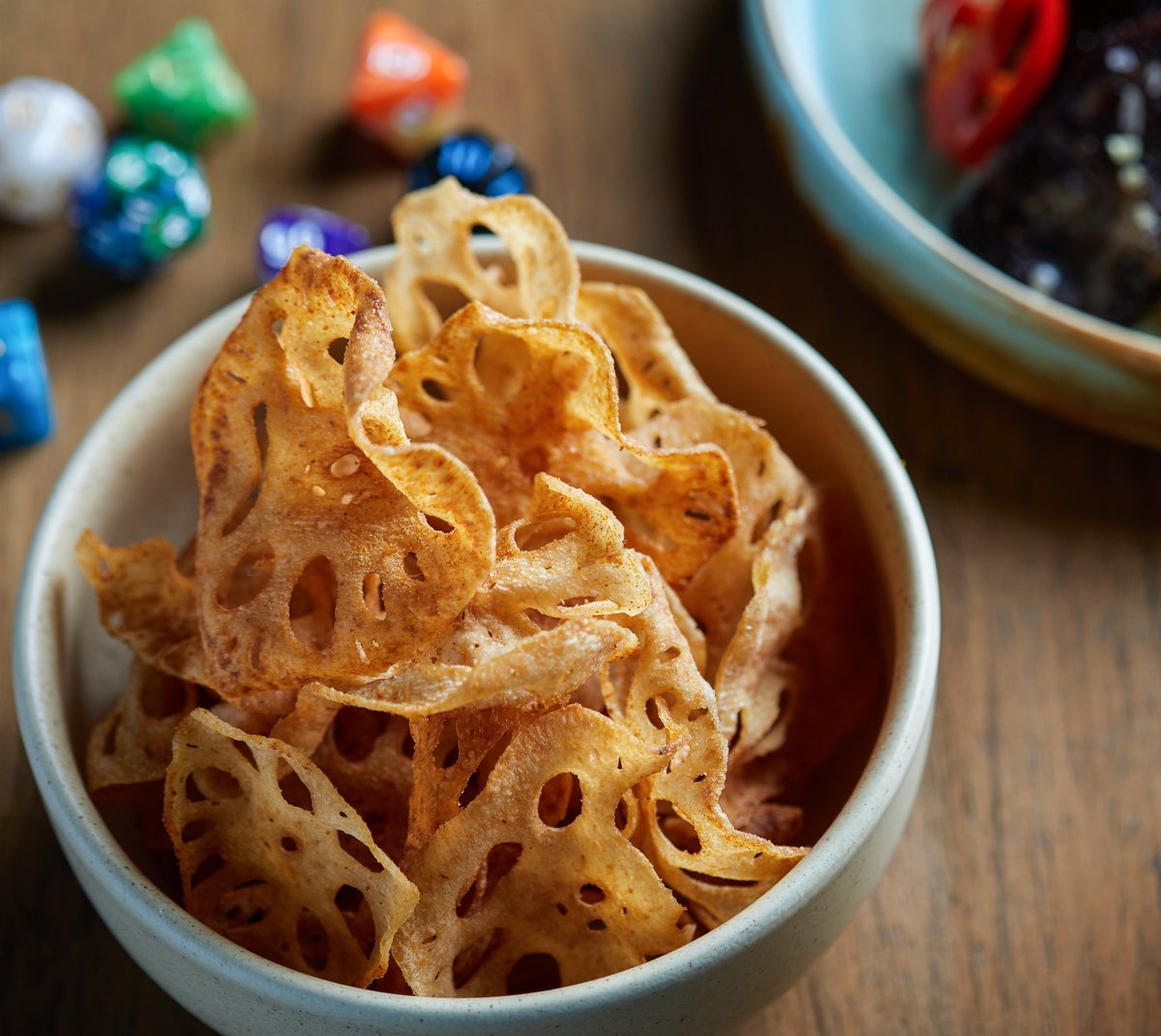 Lotus chips: crispy, salty, with a kick. The perfect snack for a #gamenight.