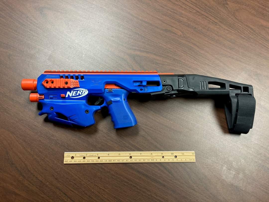 DanWat61's tweet photo. People sometimes ask why police may be rough with people carrying firearm style toys or imitation firearms? This is why! A real firearm disguised as a Nerf tou. This is why any report of a firearm is taken seriously because this could be what a police officer is faced with (1/2) https://t.co/fjCV7JEXiW
