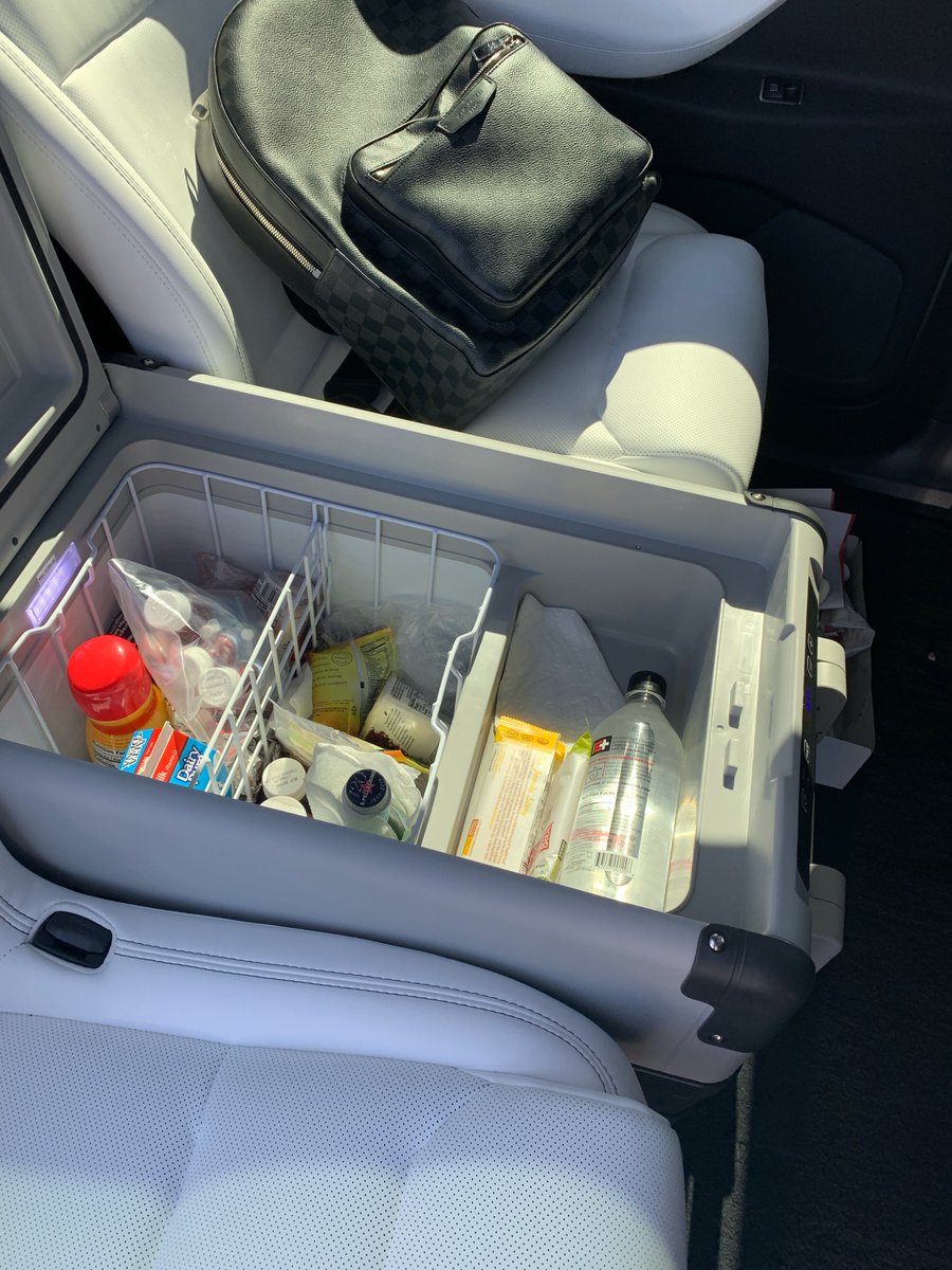BJDrew2's tweet photo. @seanmmitchell Here’s mine: 2019 Model X (P100D) 32k miles. Have the six-seat config and found a nifty powered fridge + freezer that fits nicely between the middle row. Cool drinks, snacks (and sometimes ice cream) abound no matter how long the trip. Big batteries rock! 😃 https://t.co/7Q6oV4pCBD