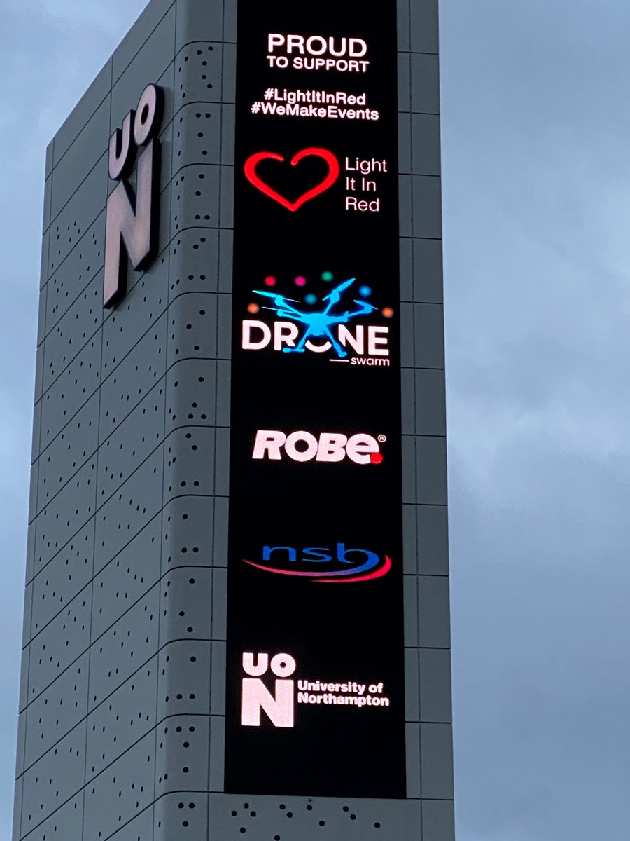 RobeAroundTheUK's tweet photo. @UniNorthants @UniNorthantsNews supporting #LightItInRed #WeMakeEvents tonight! 

#RobeAroundTheUK #DroneSwarm #NSB #UoN https://t.co/hmlu2YyQ1n