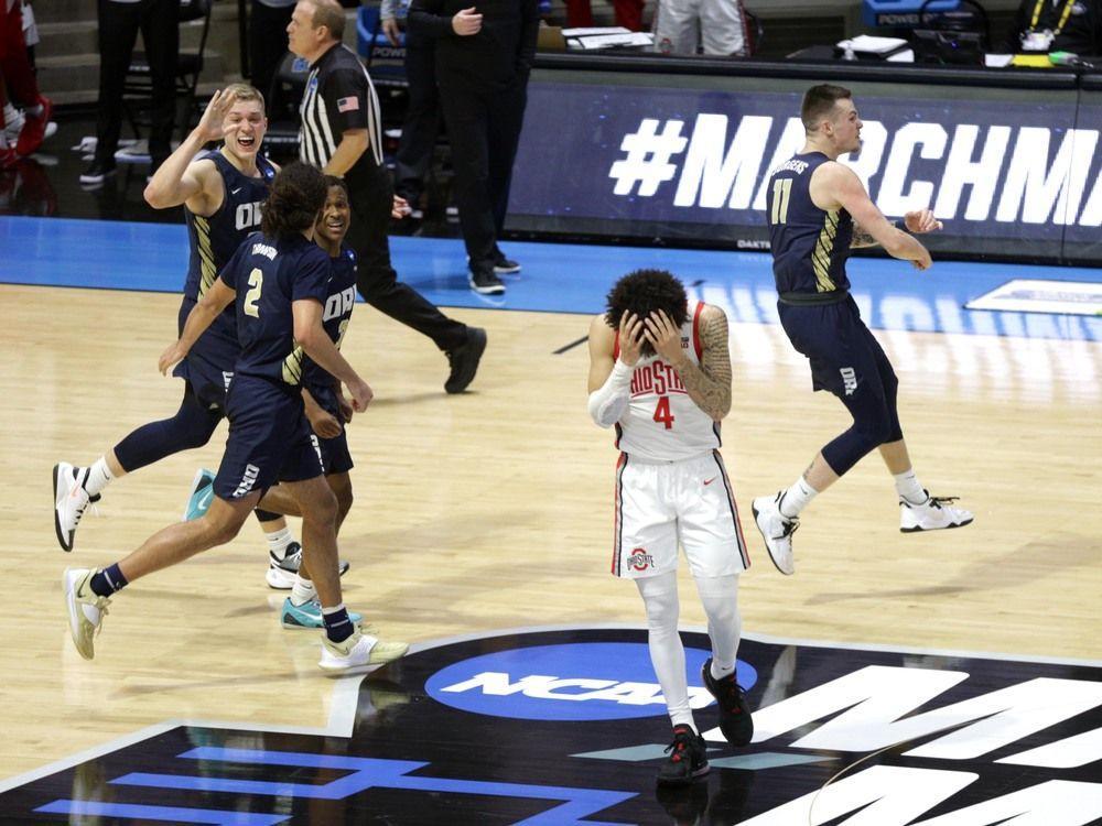 HOOP IT UP Giant killer Oral Roberts stuns Ohio State in NCAA men's tournament opener