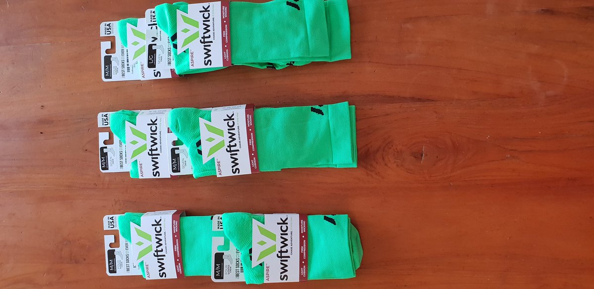 GCPPhysio's tweet photo. @SimonBallinger3 bright green socks all ready to go for team GCPs bike relay from Bordertown to Kingston 27th March. https://t.co/9XrLhBIwEV