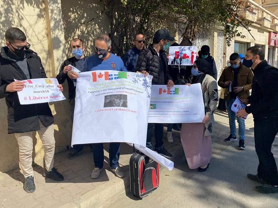 themapledreamer's tweet photo. @CitImmCanada Sit-in on 18/03/2021 in front of the Canadian Embassy in Algiers &amp; Rabat.
"One year of lockdown... they came with their children with their suitcases to tell the federal government... Enough is enough!" #free_copr_after_march18 @marcomendicino @CTVNews @CBCNews @TorontoStar https://t.co/uMBk3sPICH