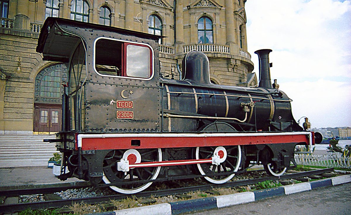 Ranaroth2's tweet photo. TCDD 23004. 2-4-0IC. Sharp Stewart works no. 3501, 1888. Tender is in Camlik museum. Photo: Haydarpaşa station, Istanbul, Turkey, after 1998. #steam #preserved #plinthed #SharpStewart #railway #locomotive #Istanbul #Turkey @SalopianLyne https://t.co/VWoH2Pi8qe