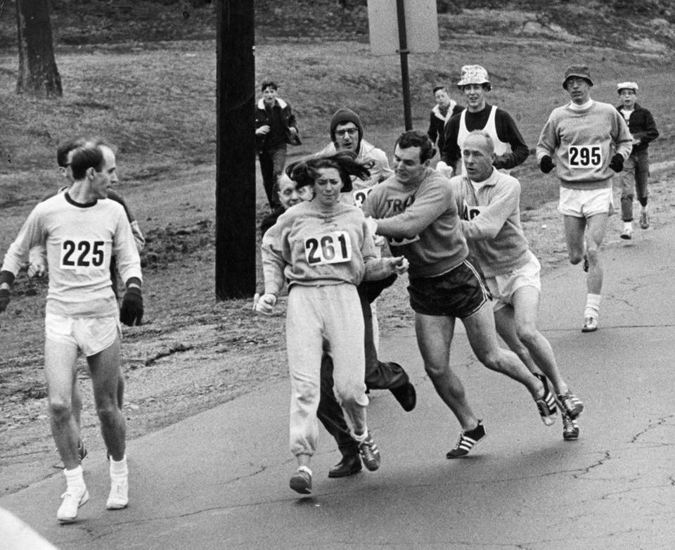 What’s Going On In This Photo? Spark a discussion with students this week. In 1967 the first female runner in the Boston Marathon is pushed off the course for trying to run the race.