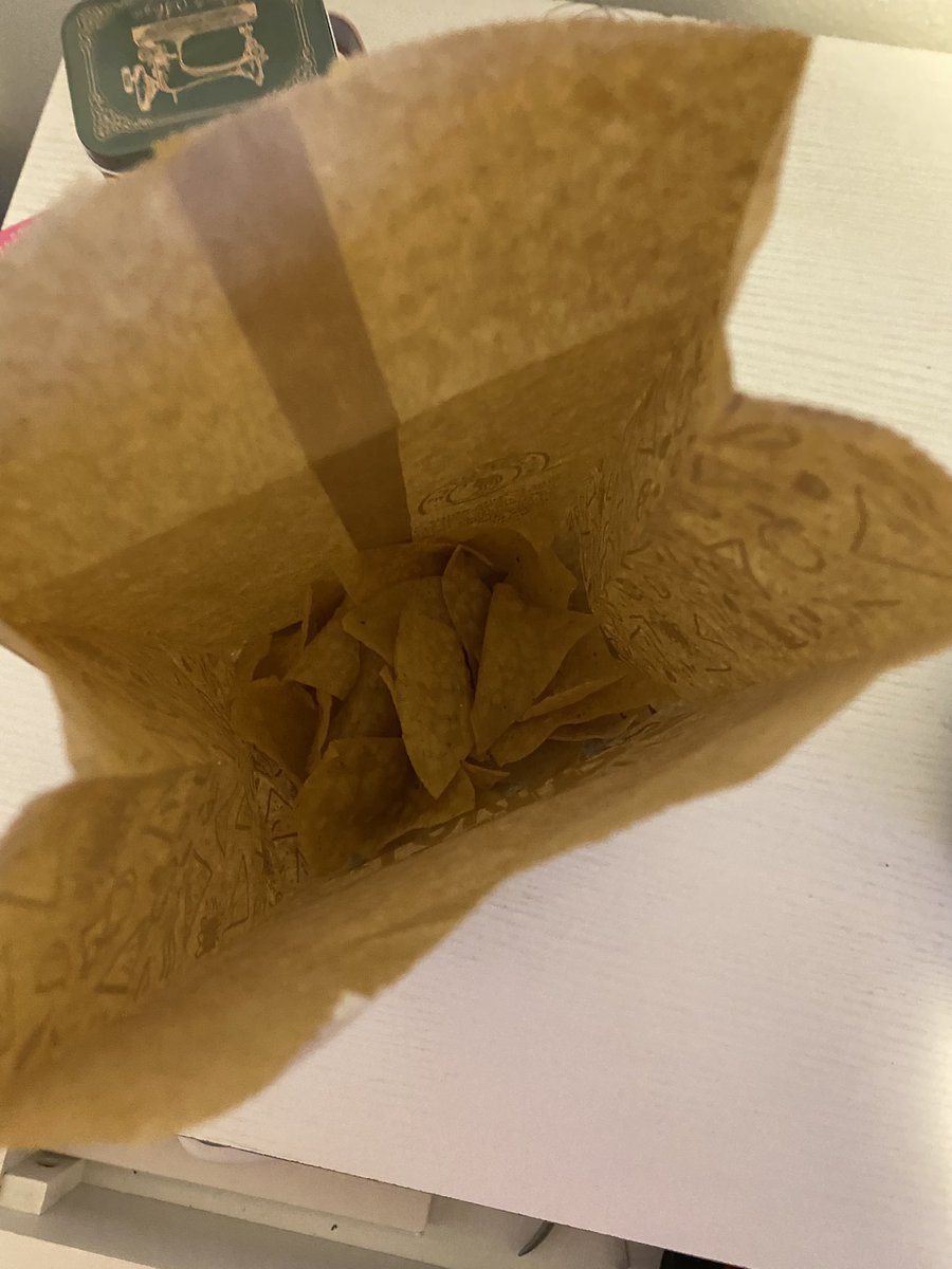 alsteph07's tweet photo. @ChipotleTweet 1/4 bag of chips and a tiny cup of queso? The disrespect 🤦🏻‍♀️ https://t.co/4wbwbVtYJ1